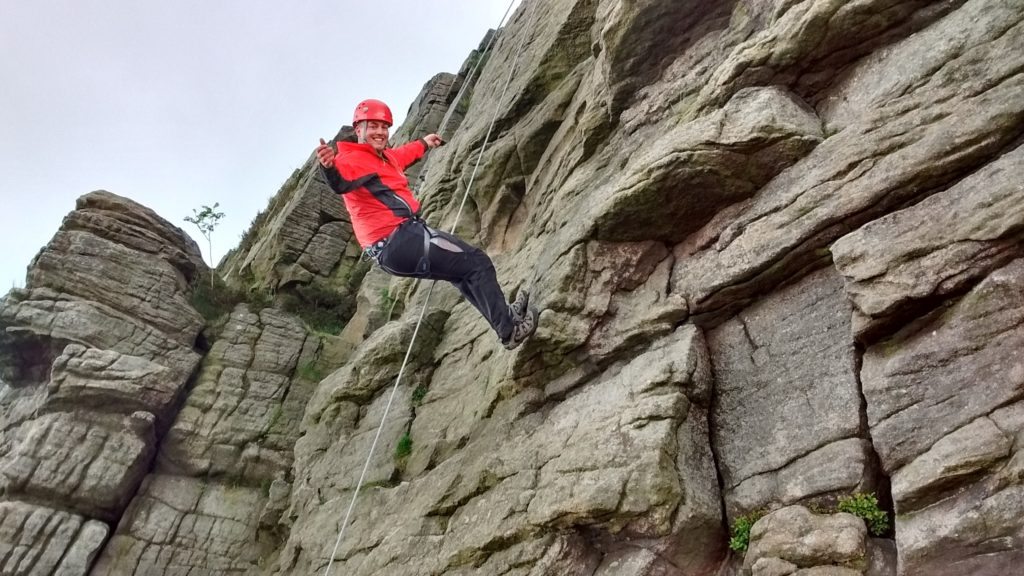 Rock climbing and abseiling in the Peak District